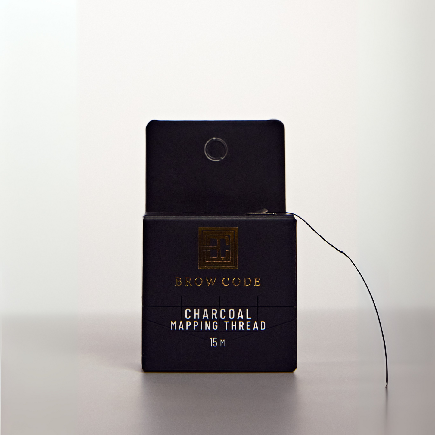 Charcoal_Brow_Mapping_Thread_Packaging against background
